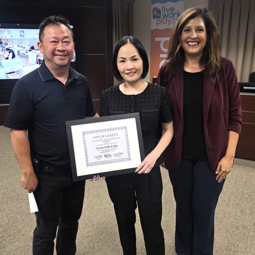 Ocean Nail and Spa owners with Councilmember Reyes-Martin receiving the proclamation