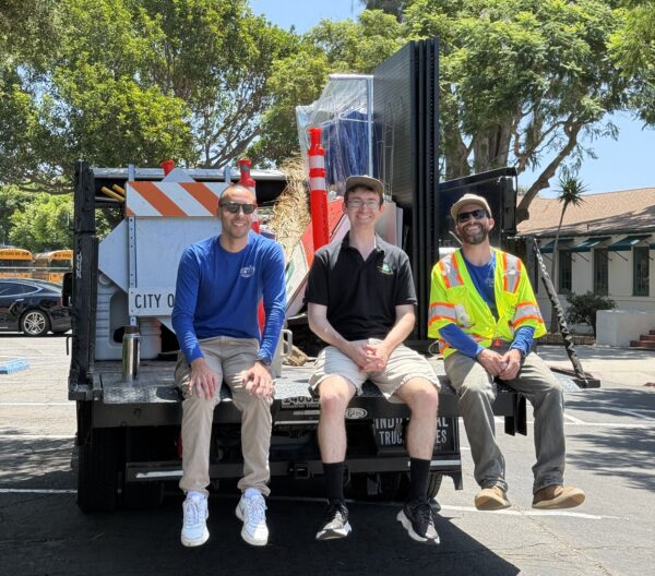 Three City staff on back of truck after Beautify Goleta Event