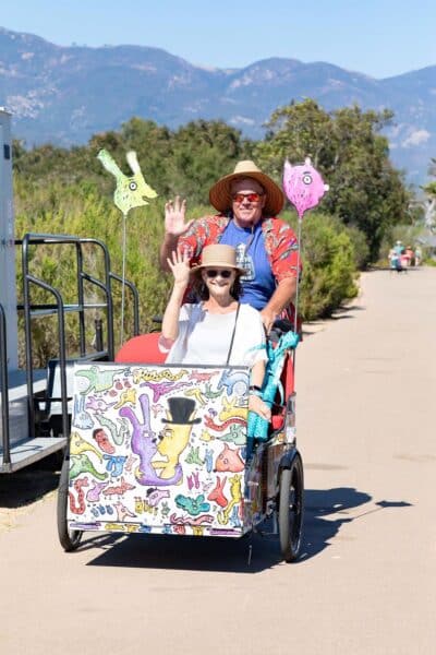 Person riding in a trishaw at the Dam Dinner 2026